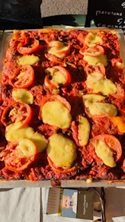 La coca poivrons tomates (la portion).
