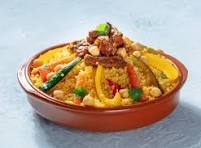 Couscous agneau, poulet, merguez. La portion
